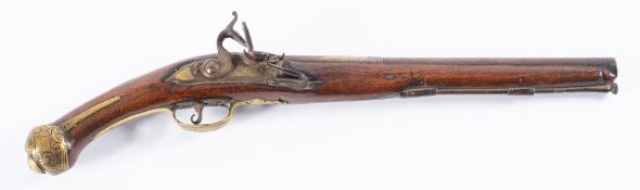 An Indian flintlock pistol, the 12 inch barrel with brass inlay to breech sidelock action,