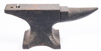 A 20th Century cast iron and painted anvil of small size, maker Henry Wright, England.