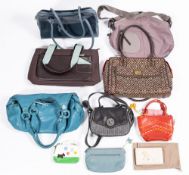 A group of five Radley handbags.