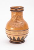 A late 19th/ early 20th century Doulton Lambeth Bellarmine Style jug 'Fill what you will and drink