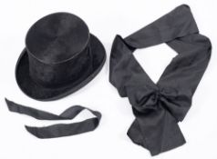 A Lincoln Bennett and Co black silk top hat.
