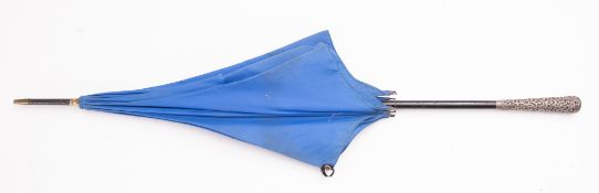 An early 20th Century silver mounted parasol.