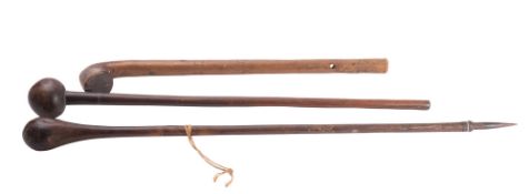 Two late 19th century knobkerries, one with iron spike to foot,