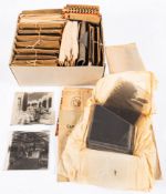 A collection of early 20th Century photographic negatives.