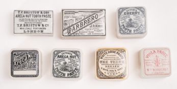 Seven various square and rectangular potlids and bases, including 'Marbero Tooth Paste' ,