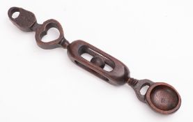 A 20th Century Welsh carved love spoon.