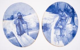 A pair of Doulton Burslem 'blue children' oval plaques,