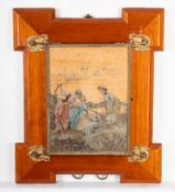 A stained wood and decorated tripartite