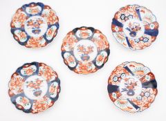 Five Imari porcelain plates, of scallope
