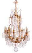 A gilt metal and glass sixteen-light 'cage' chandelier, in Louis XV style,