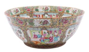 A Canton porcelain punch bowl decorated to the interior and exterior with panels of figures