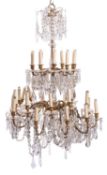 A gilt metal and cut glass thirty-light chandelier in early 19th century style,