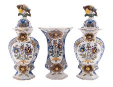 A garniture of three Dutch Delft vases De Posteleyne Byl [The Porcelain Hatchet]