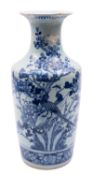 Four pieces of Chinese blue and white porcelain comprising an oviform jar with a vertical incised