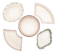 A group of four Wedgwood and other creamware dishes and a bowl,