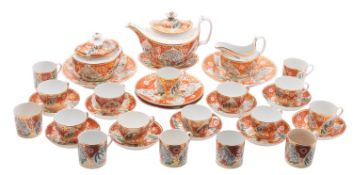 A John Rose Coalport porcelain tea service decorated with a Japan pattern reserved on an orange