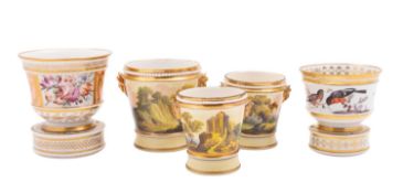 A garniture of three small Coalport jardinieres and stands and two other small jardinieres and