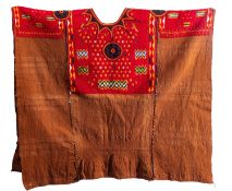 A mixed lot of textiles including a Guatemalan handwoven huipil [woman's blouse] 20th century;