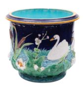 A large George Jones majolica 'swan and bullrush' jardiniere, circa 1880 relief moulded with swans,
