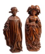 Two Dutch carved oak figures of a man and a woman, in late 16th century style,