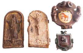 Four Continental carved wood wall reliefs;