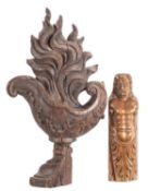 A Continental carved oak finial, 18th century; modelled as a flambeau antique oil lamp, 49cm high,