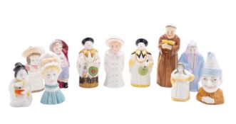 Eleven reissued Royal Worcester candle extinguishers comprising The Monk.