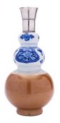 A Chinese porcelain vase, Kangxi of triple gourd form,