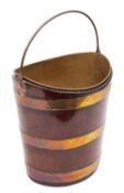 A Dutch mahogany and brass banded 'kettle stand' or bucket, 19th century; of oval section,