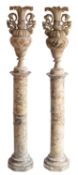 A pair of Italian alabaster vases on pedestals, in Neoclassical taste, circa 1900; with wavy rims,