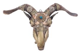 A Tibetan ram's skull kapala,