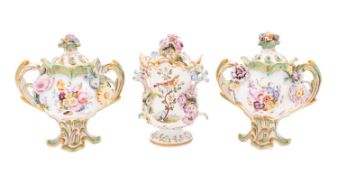 A pair of small Coalbrookdale two-handled pot-pourri vases and covers and a similar vase and cover,