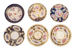 A pair of Coalport blue-ground dessert plates, three similar plates and a saucer dish,