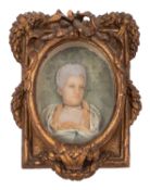 A Continental wax portrait bust of a lady, perhaps a maîtresse of King Louis XV's court,