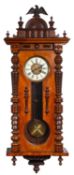 A late-Victorian German Vienna style wall regulator the eight-day duration movement striking the