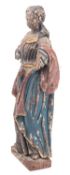 A Continental, possibly Spanish carved and polychrome wood model of a female saint,