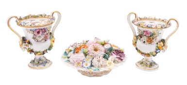 A pair of Bloor Derby pot-pourri/flower vases and liners together with a Minton basket of flowers,