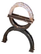 A pair of cast iron bench supports,