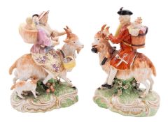 A pair of large Derby figures of the Welch Tailor and his Wife, early 19th century riding goats,