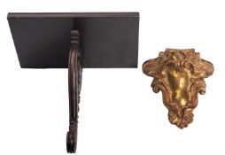 A George IV rosewood wall bracket, circa 1825; the rectangular top with moulded edges,