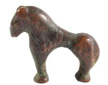 AN ISLAMIC BRONZE MODEL OF A STYLISED HORSE, CIRCA 9TH CENTURY A.D., 3cm.