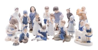 Twelve Royal Copenhagen porcelain figures, primarily of children and comprising Girl with Sheaf,