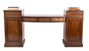 A George IV mahogany and ebony banded pedestal sideboard, in the manner of Thomas and George Seddon,