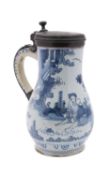 A large German blue and white faience pewter-mounted tankard,