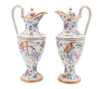 A pair of Chinese Export famille rose ewers and covers,