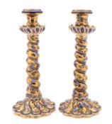 A pair of Coalport blue and gilt candlesticks in Aesthetic movement style,