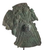 AN ASSYRIAN BRONZE ROUNDEL FRAGMENT, repoussé and chased with figures, birds and animals,