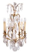 A gilt metal and glass six-light 'cage' chandelier, in Louis XV style,