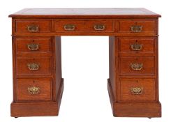 An oak pedestal desk in George III style,