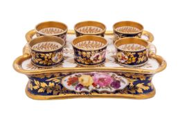 An English porcelain egg cup stand,